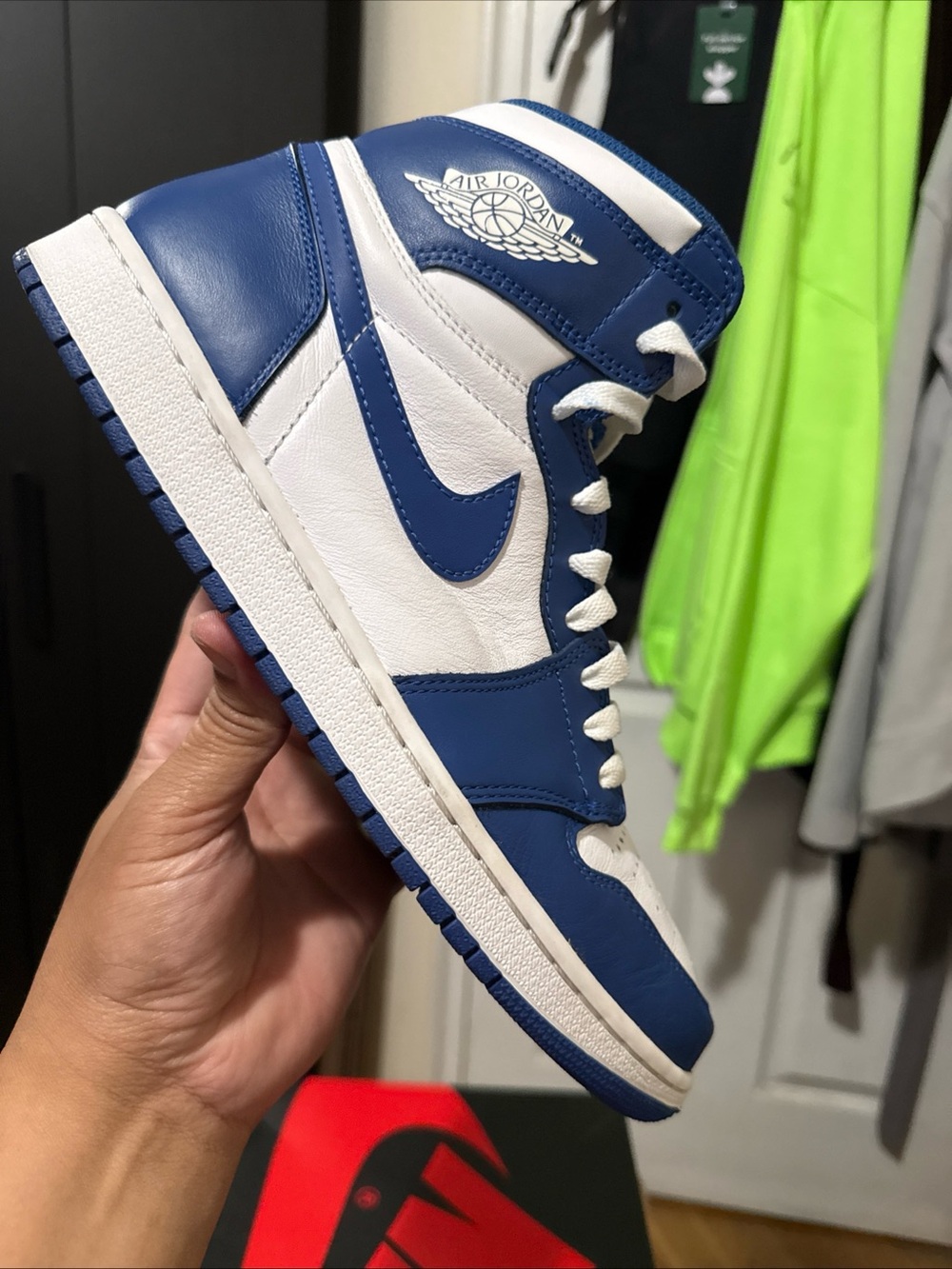 Jordan Air Jordan 1 Mid White and Blue Sneakers